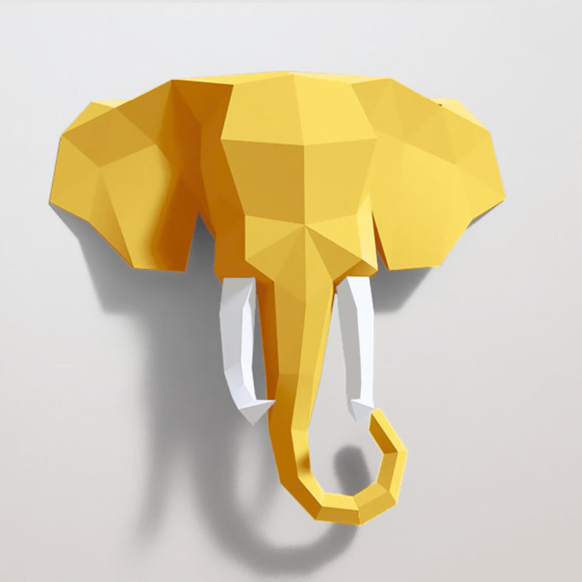 Elefante amarelo e branco